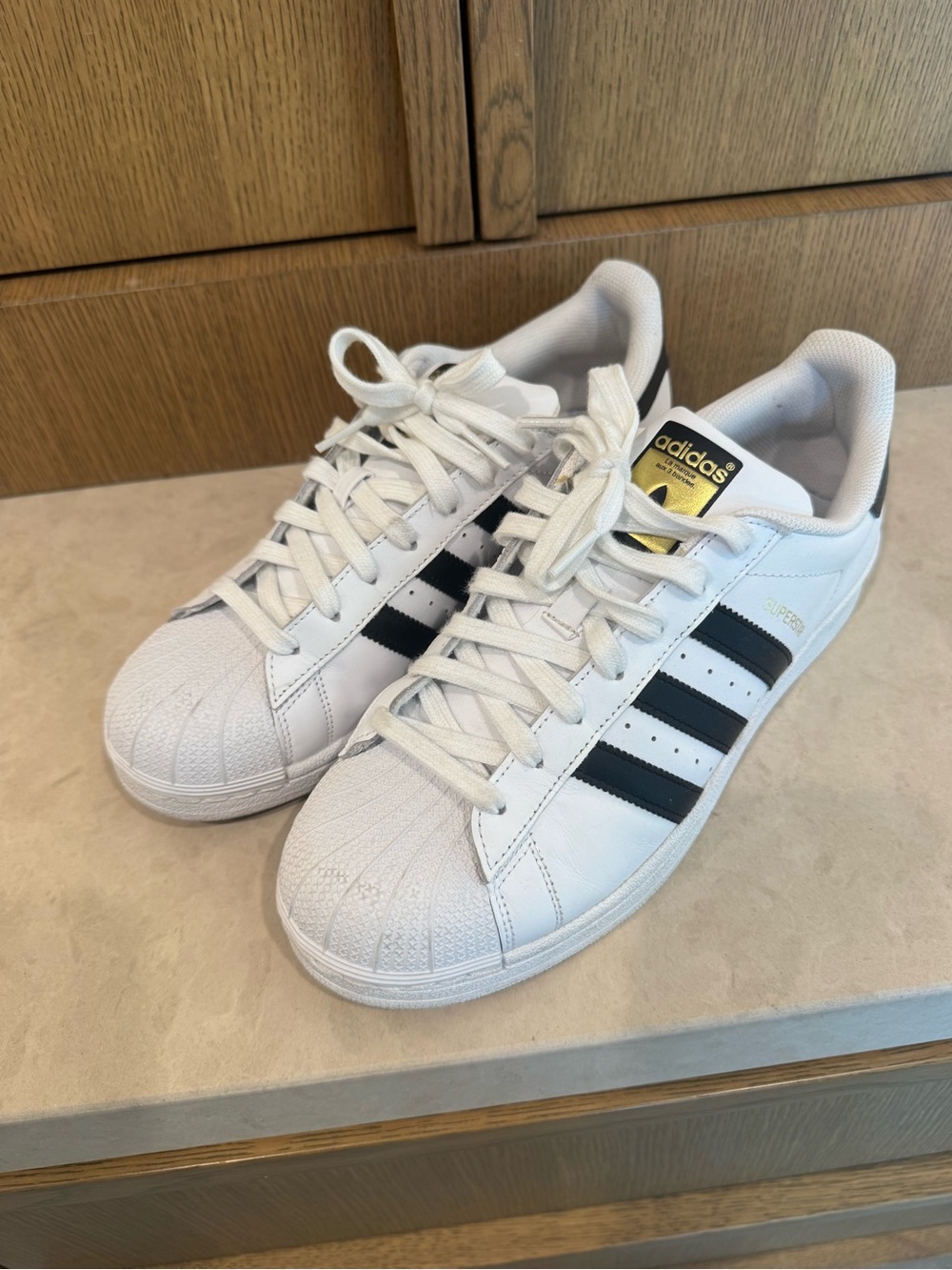 Mens' Superstar Sneakers in White with Black Stripes